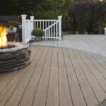 Azek Decking by TimberTech installed in a deck with a bonfire.